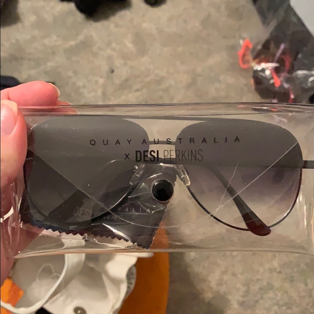 Desi Perkins quay Austrailia high key aviator sun